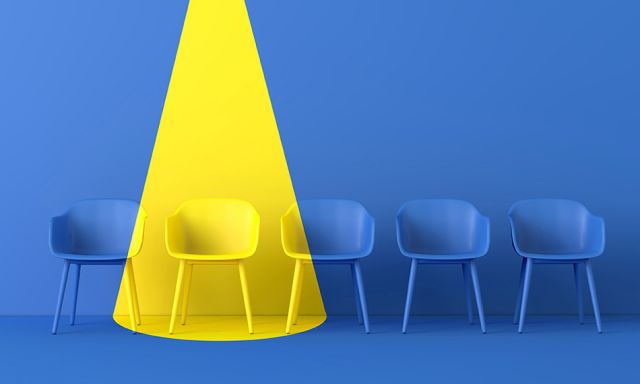 Yellow chair standing out from the crowd. Business concept. 3D rendering